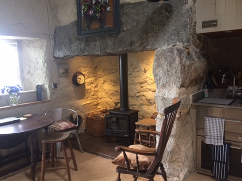 large inglenook with a duel fuel stove